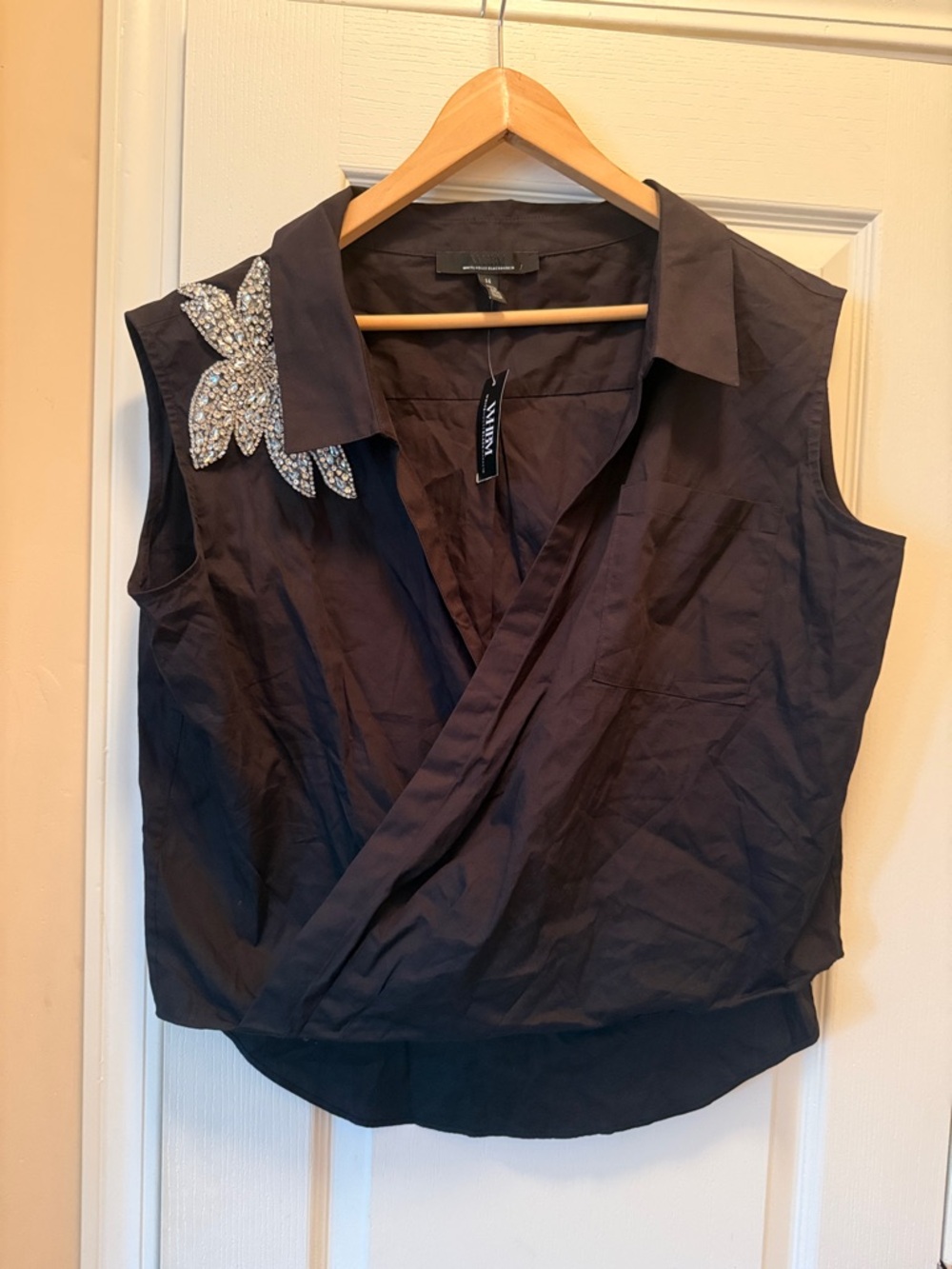 Sleeveless Black Wrap  Women Top with Crystal Floral Accent